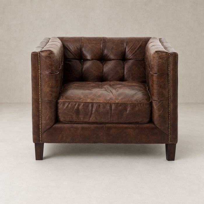 Venice Club Chair in Cigar leather featuring tufted cushions and a sturdy frame.