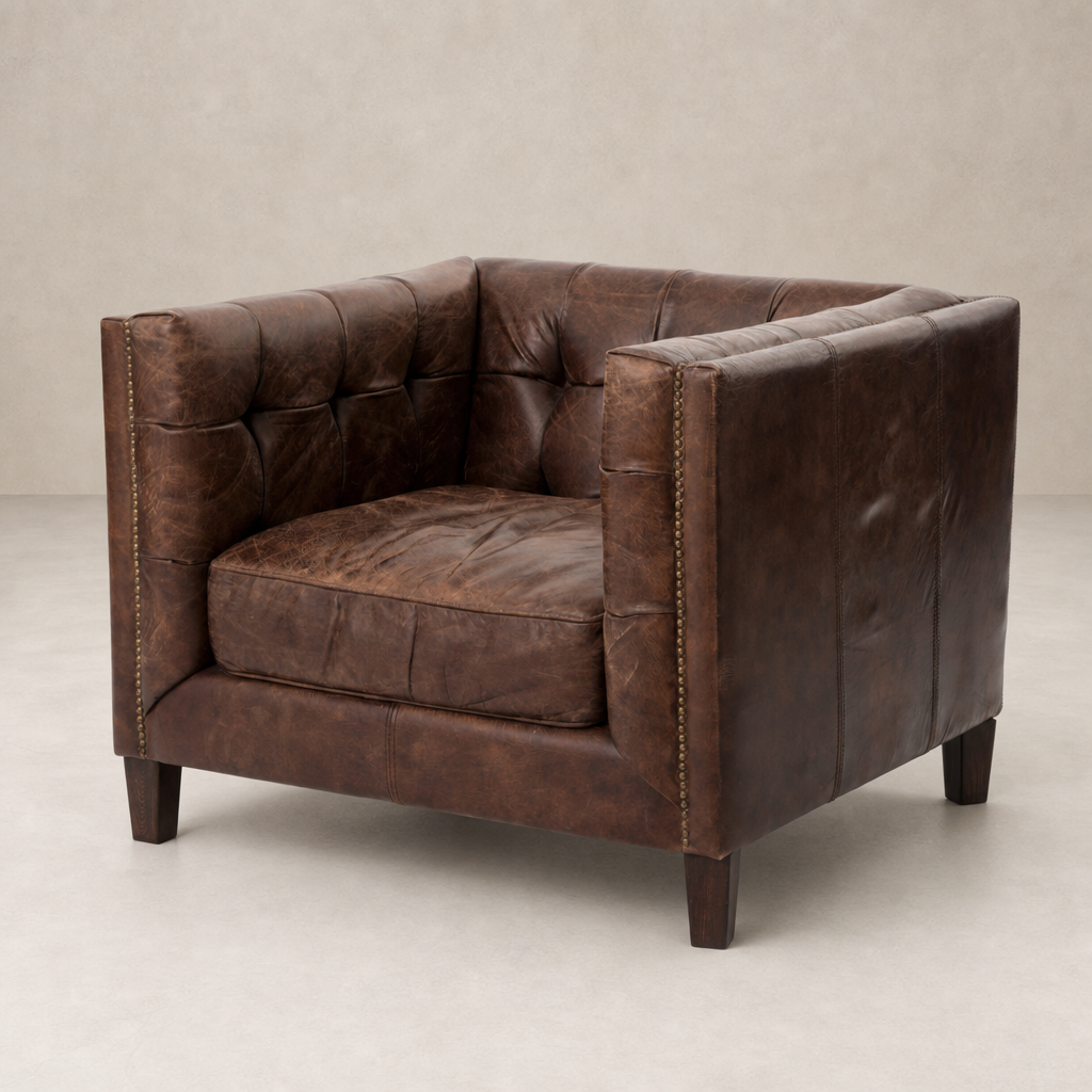 Venice Club Chair in cigar color featuring a plush tufted design and sturdy wooden legs.
