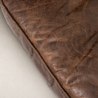 Close-up of Venice Club Chair in cigar leather showing rich texture and detailing.