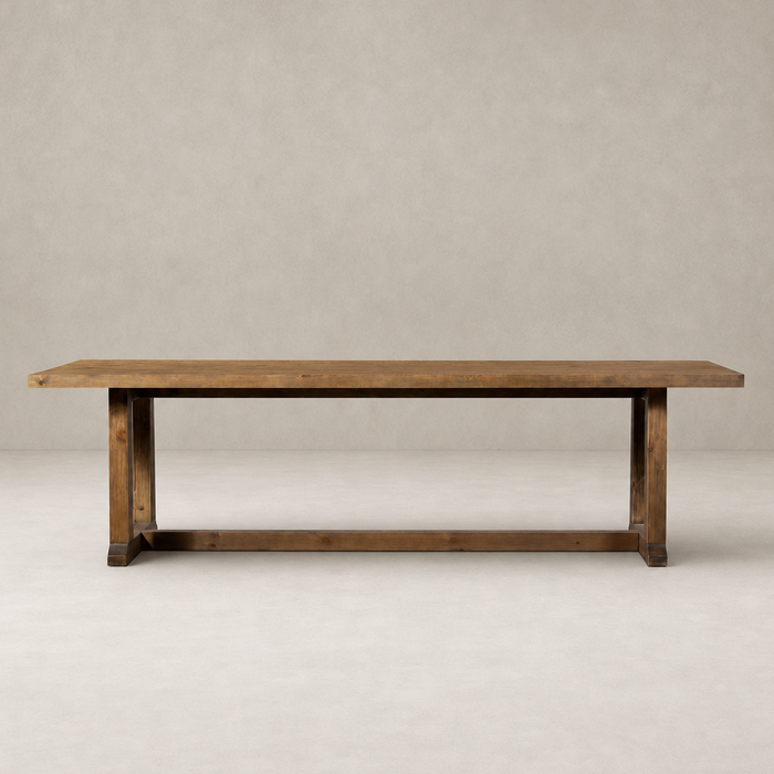 Landsbury Dining Table in waxed pine with a rustic, sturdy design and smooth finish.