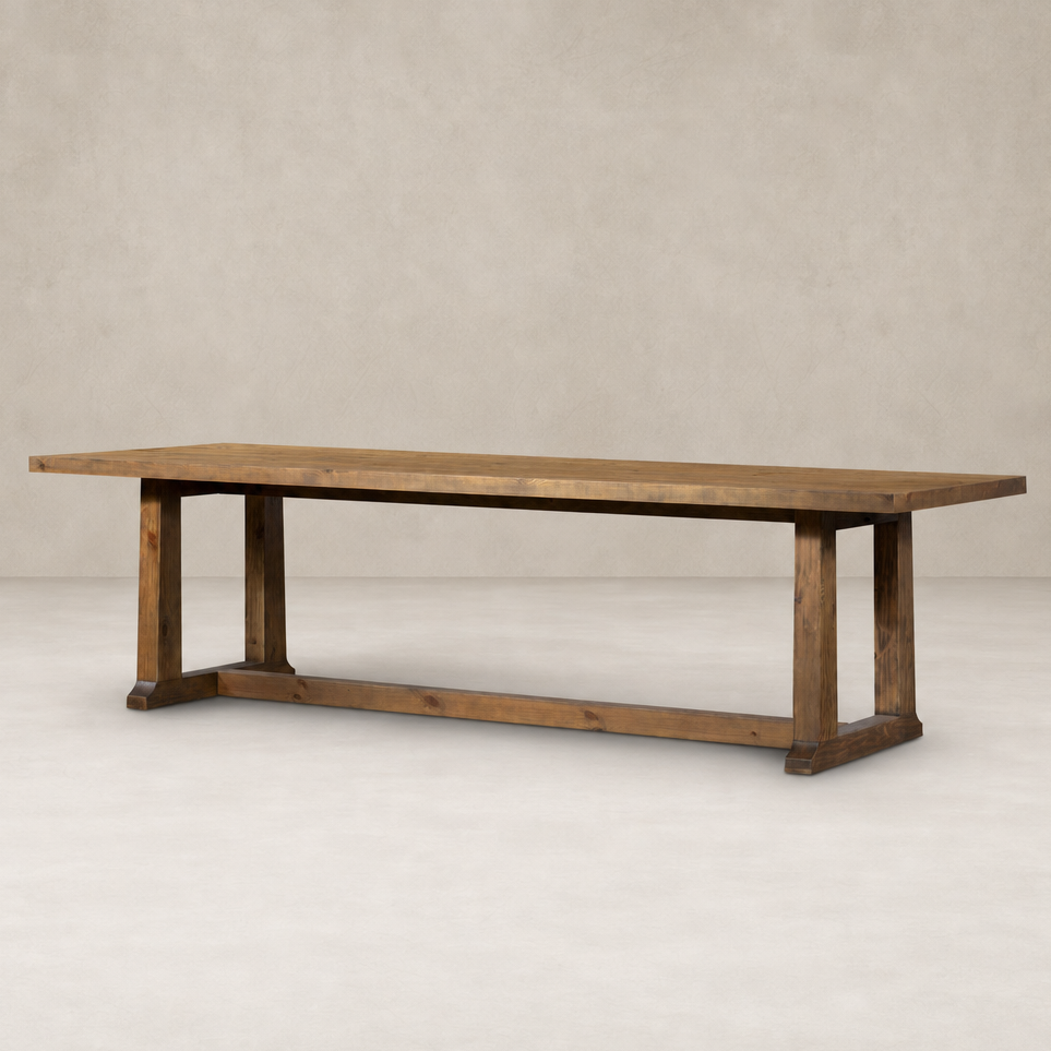 Landsbury Dining Table in waxed pine with a sleek, minimalist design and sturdy legs.