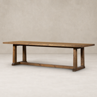 Landsbury Dining Table in waxed pine with a sleek, minimalist design and sturdy legs.
