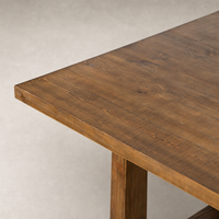 Landsbury Dining Table in waxed pine with a rustic wood grain finish.