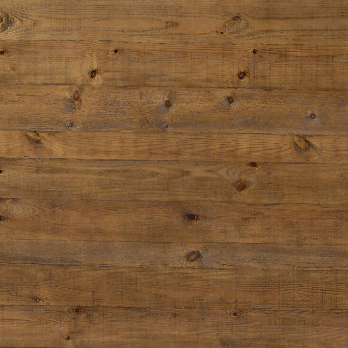 Waxed Pine surface of the Landsbury Dining Table showcasing natural wood grain texture.