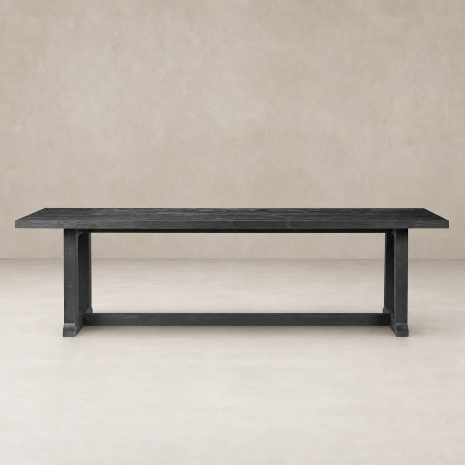 Landsbury Dining Table in black pine featuring a sleek, rectangular design and sturdy legs.