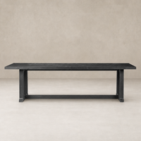Landsbury Dining Table in black pine featuring a sleek, rectangular design and sturdy legs.