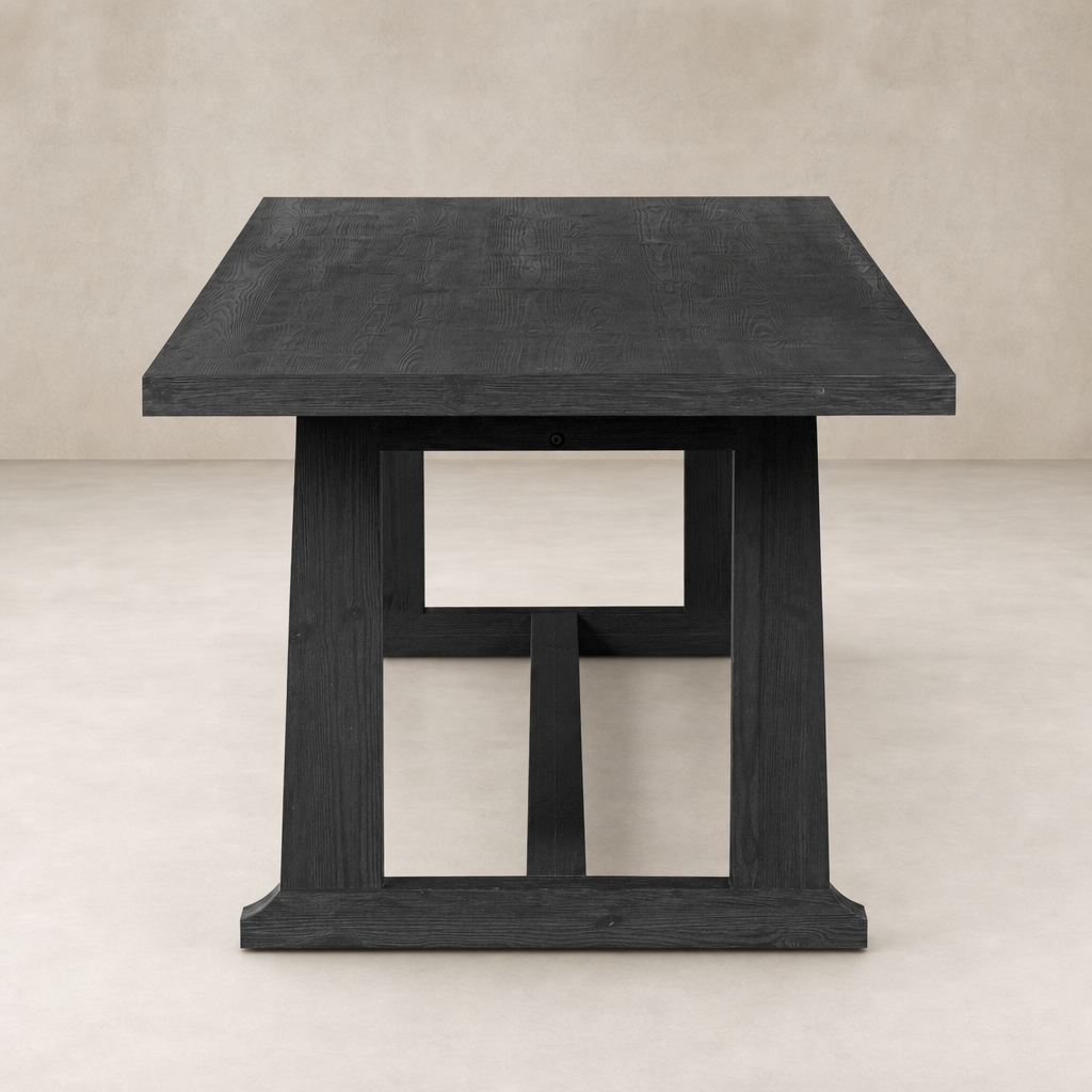 Landsbury Dining Table in black pine with a sturdy square structure and smooth finish.