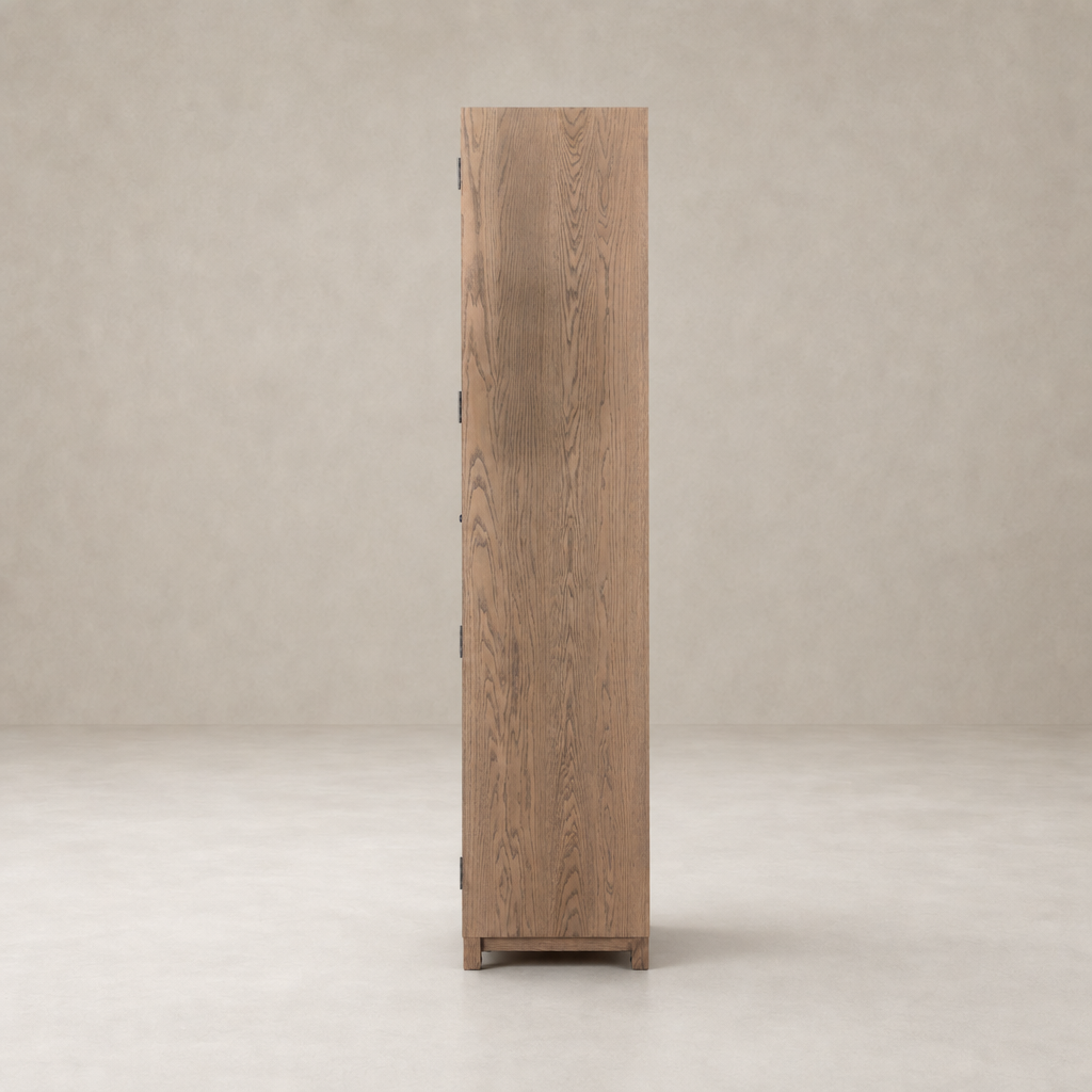 Kyra Cabinet in drifted oak with a sleek, minimalist design and natural wood grain.