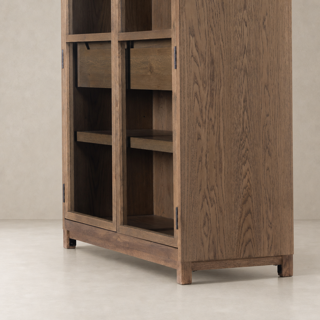 Drifted Oak Kyra Cabinet featuring open shelves and a sleek, modern design.
