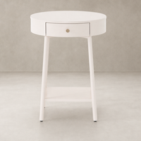 Finn Nightstand with a round top, single drawer, and sleek white finish.