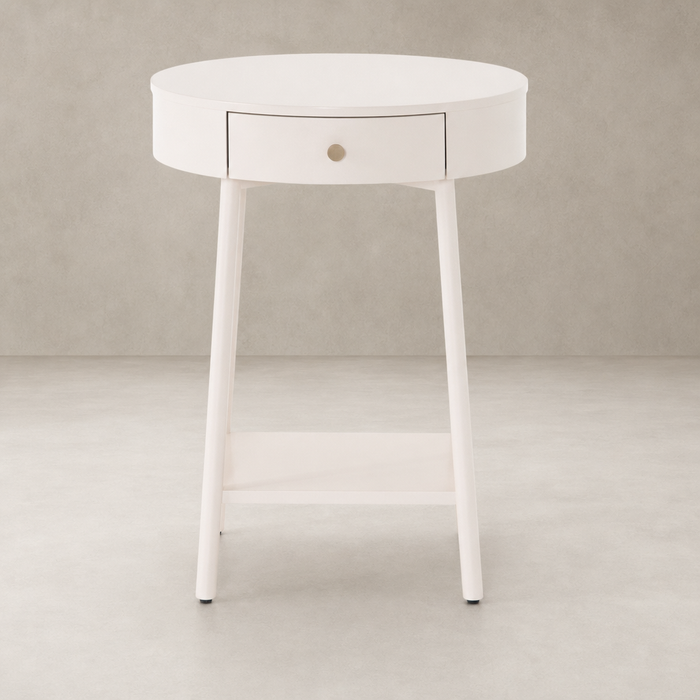 Finn Nightstand with a round top, single drawer, and sleek white finish.