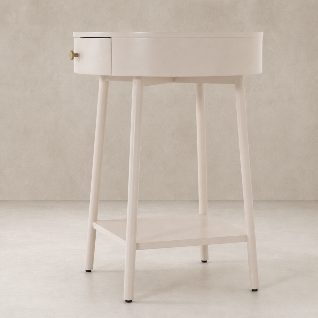 Finn Nightstand in a soft finish features a round design with a spacious drawer.