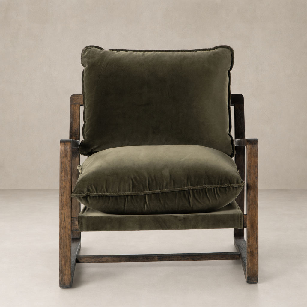 Sawyer Chair in Surrey Olive with plush cushions and warm wooden frame.