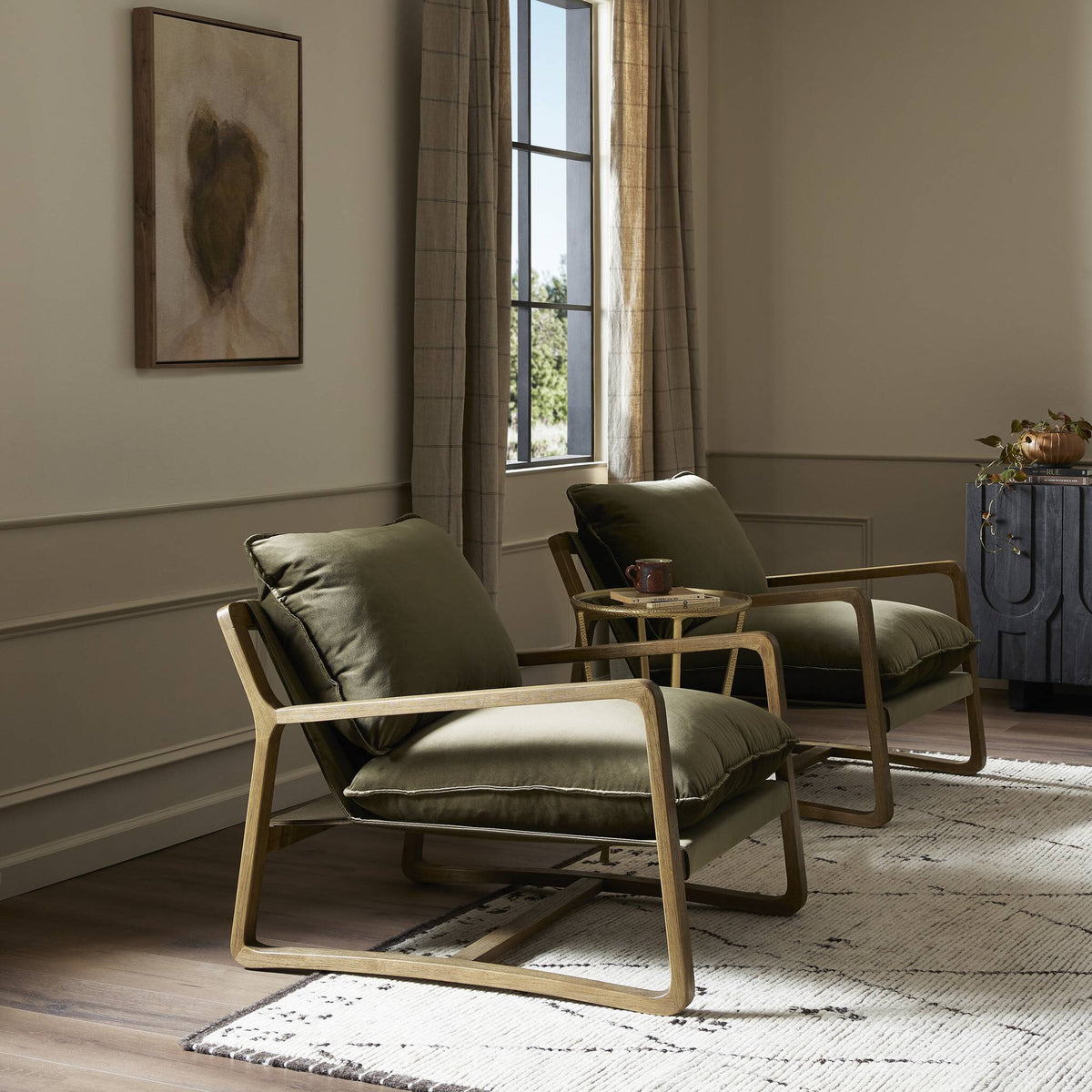 Surrey Olive Sawyer Chair with plush cushions and sleek wooden frame in a cozy living room setting.