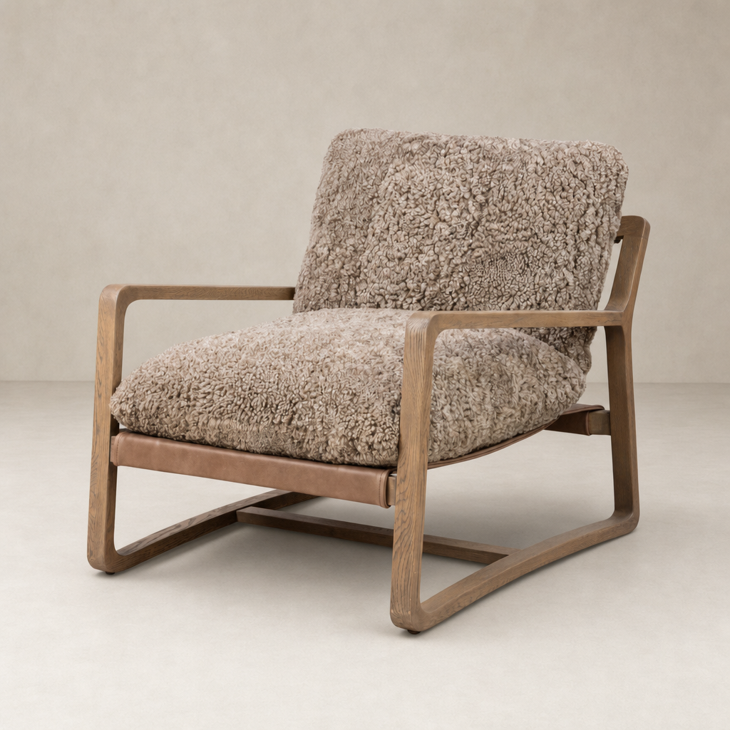Taupe shearling Sawyer Chair with a curved wooden frame and plush seating.