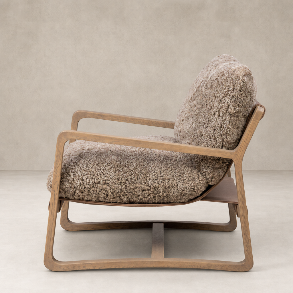 Taupe shearling Sawyer Chair with a sleek wooden frame and plush cushioning.