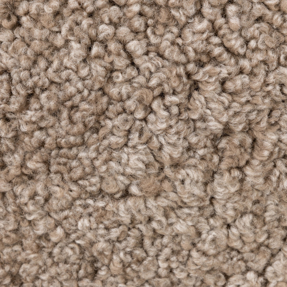 Close-up of taupe shearling fabric texture of the Sawyer Chair.