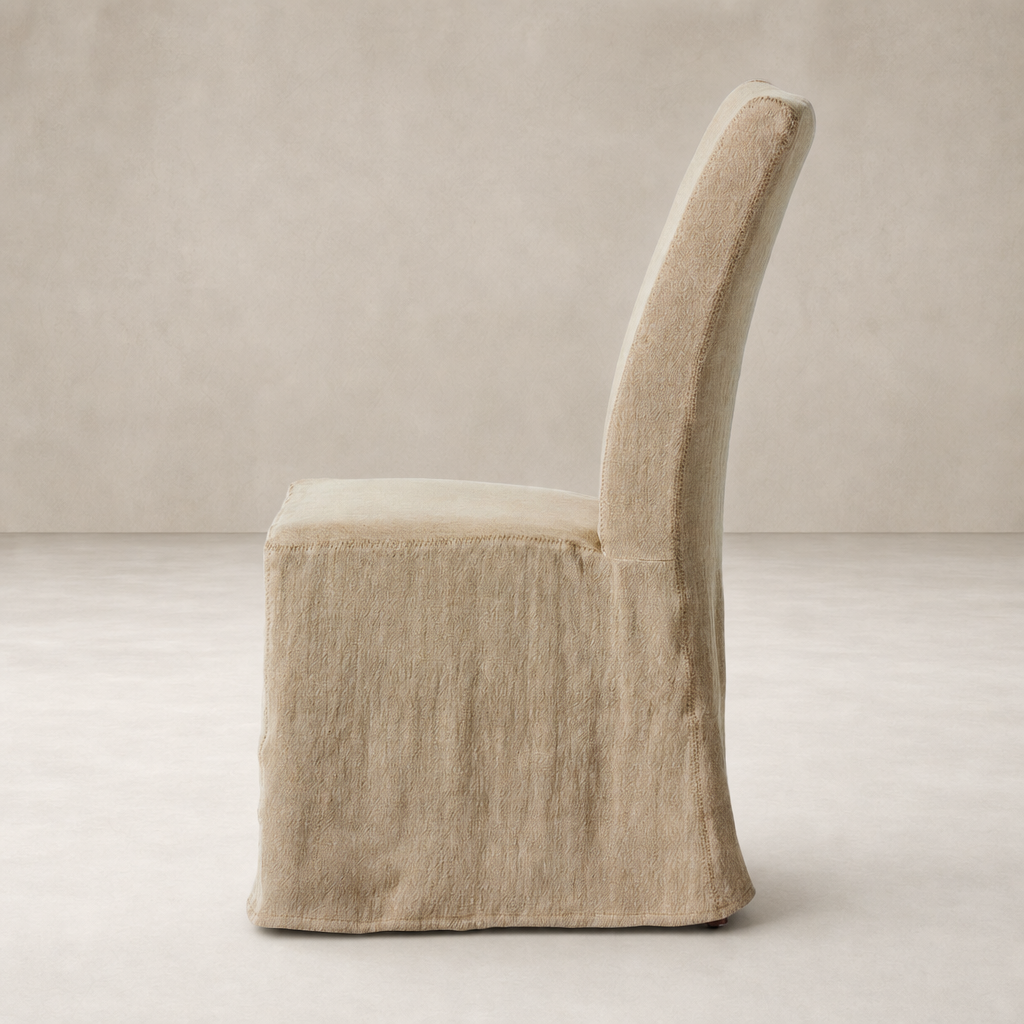 Sierra Slipcovered Dining Chair in Broadway Canvas featuring a sleek, modern shape.