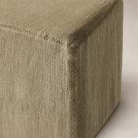 Close-up of Sierra Slipcovered Dining Chair in Broadway Canvas, showcasing textured fabric and stitching detail.