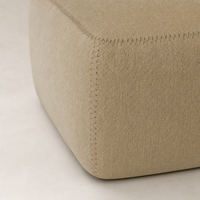 Close-up of Sierra Slipcovered Dining Chair in Broadway Canvas showing textured fabric and stitching.