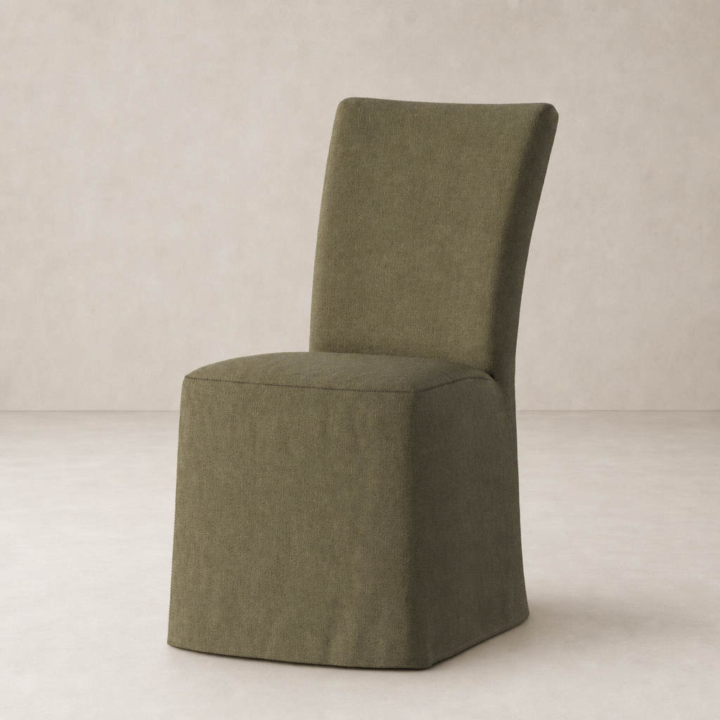 Sierra Slipcovered Dining Chair in Broadway Olive with a sleek, modern design.
