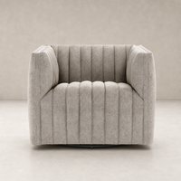 Auden Swivel Chair in Orly Natural with textured upholstery and modern design features.