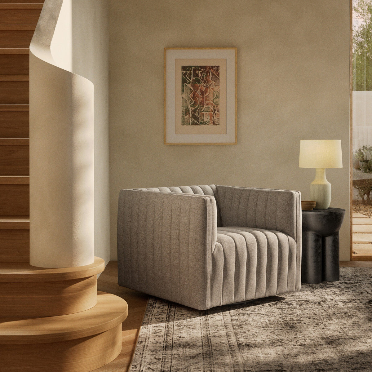 Auden Swivel Chair in Orly Natural with a plush, ribbed fabric design.