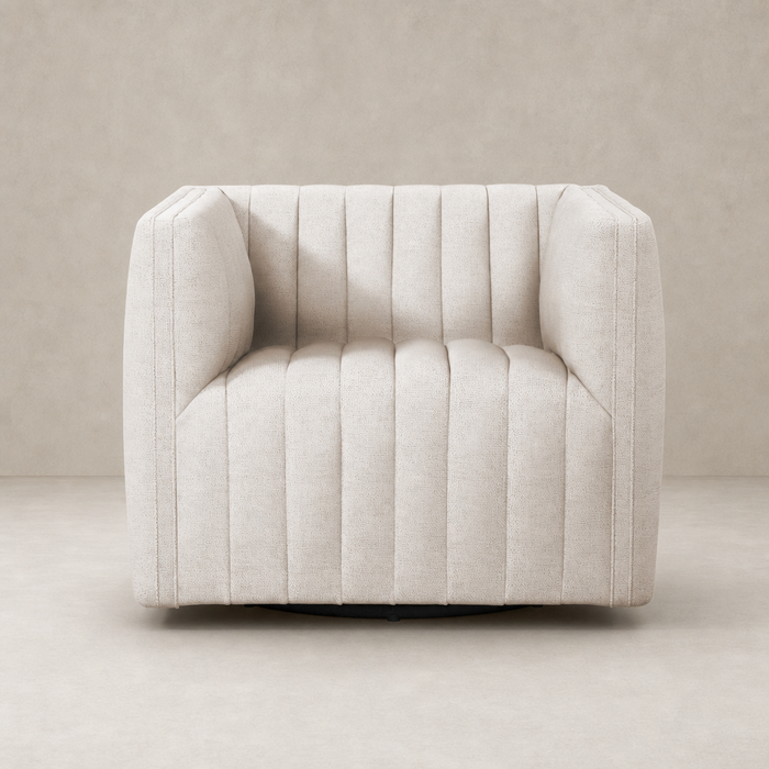 Auden Swivel Chair in Dover Crescent features a plush, tufted design and modern silhouette.