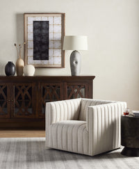 Auden Swivel Chair in Dover Crescent featuring clean lines and textured upholstery.