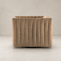 Auden Swivel Chair in Palermo Drift, showcasing a sleek, ribbed design and modern finish.