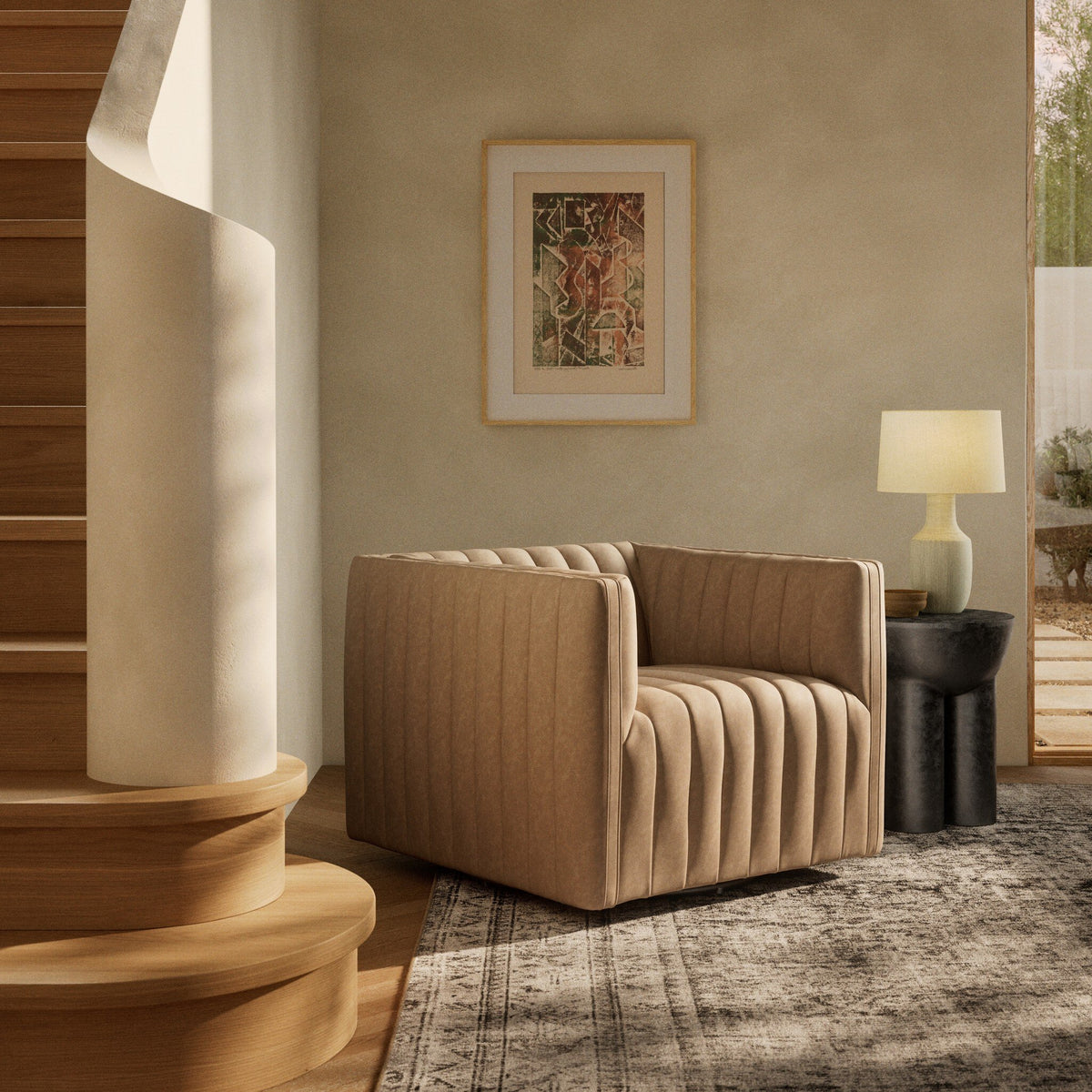 Auden Swivel Chair in Palermo Drift, featuring a modern quilted design in a cozy living space.