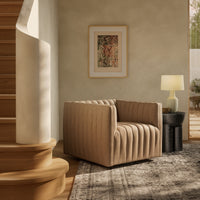 Auden Swivel Chair in Palermo Drift, featuring a modern quilted design in a cozy living space.