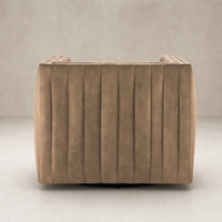Auden Swivel Chair in Palermo Drift featuring a stylish ribbed design and sturdy base.