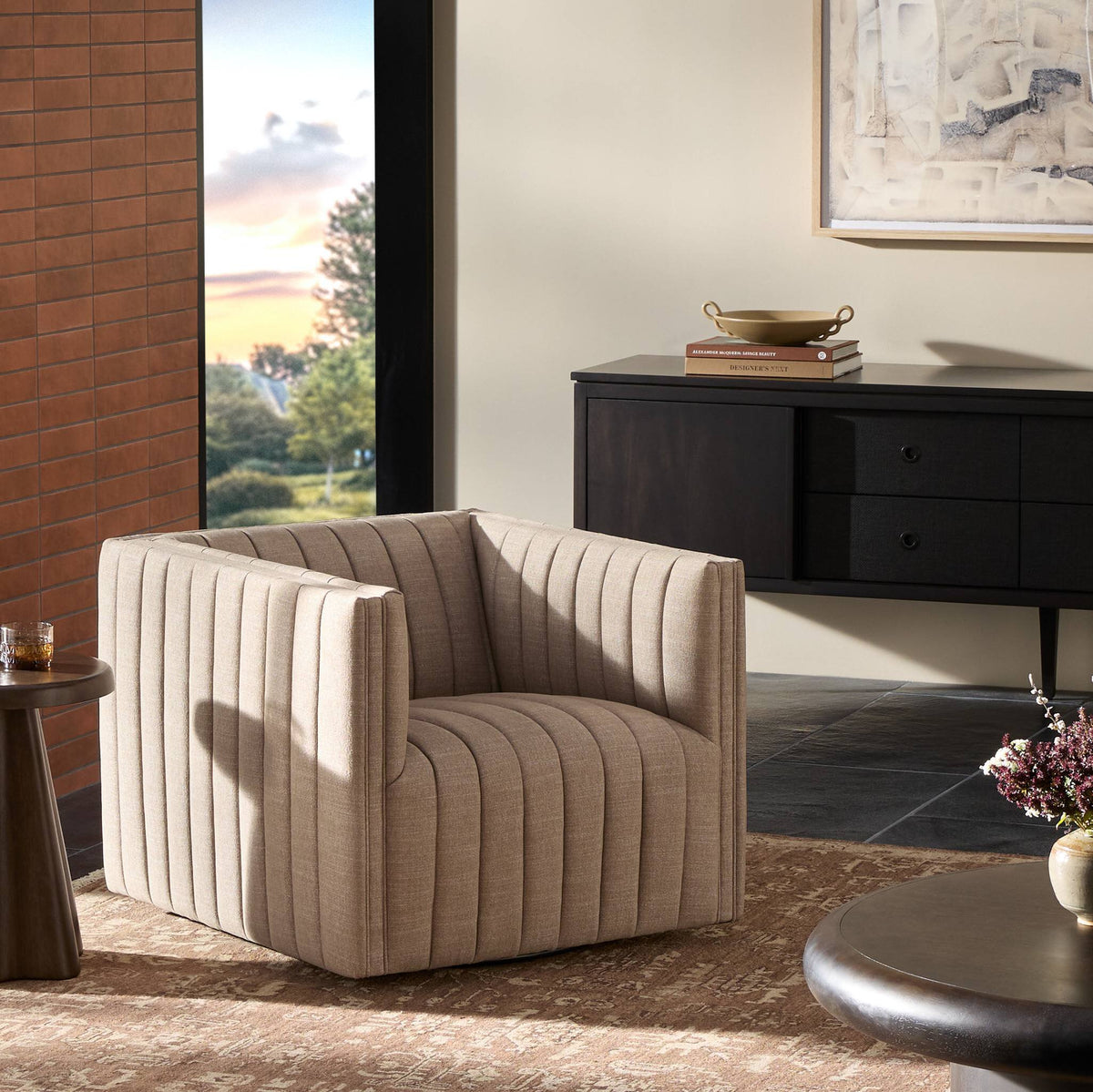 Auden Swivel Chair in Crypton Nomad Taupe with plush ribbed upholstery and modern design.
