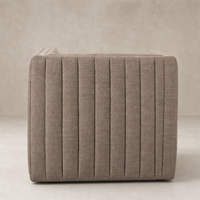 Auden Swivel Chair in Crypton Nomad Taupe featuring a ribbed back design.