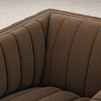 Close-up of Auden Swivel Chair in Maestro Cigar featuring textured, ribbed upholstery.