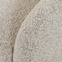 Close-up of the Magnolia Swivel Chair in Knoll Domino fabric, showcasing soft texture and unique pattern.