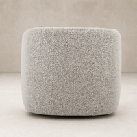 Magnolia Swivel Chair in Knoll Domino fabric, featuring a soft, textured finish.