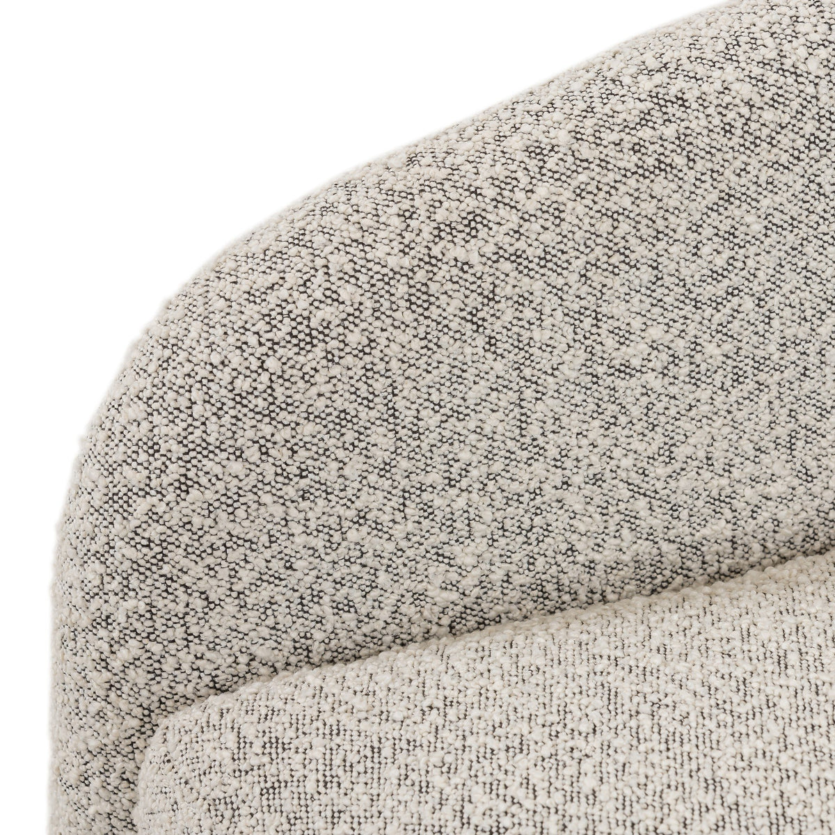 Close-up of Magnolia Swivel Chair in Knoll Domino fabric, showcasing textured beige material.
