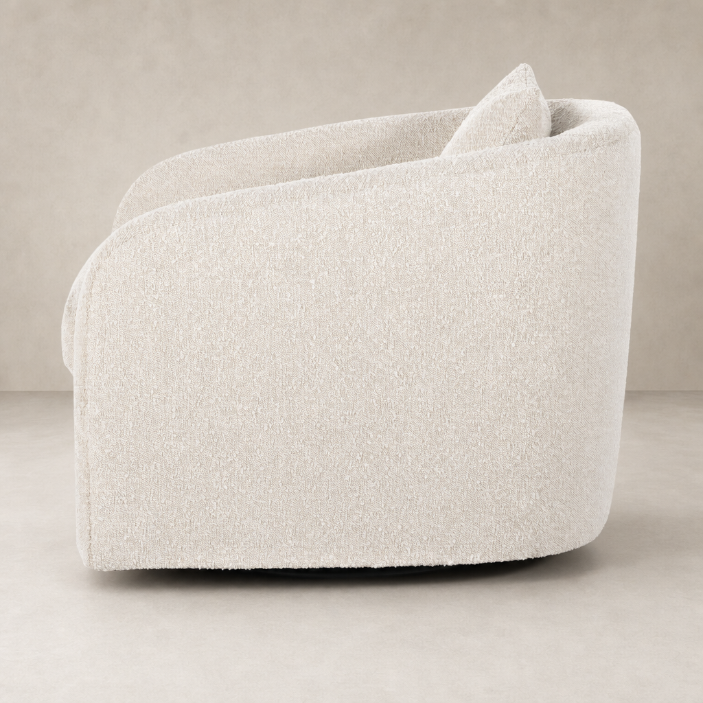Magnolia Swivel Chair in Knoll Natural features a cozy, rounded design and soft texture.