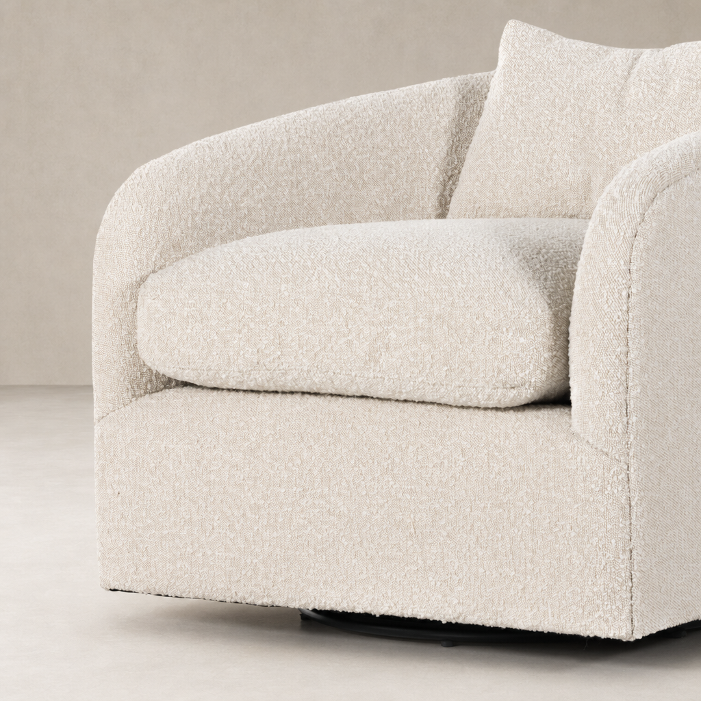 Magnolia Swivel Chair in Knoll Natural featuring plush, textured upholstery and rounded silhouette.