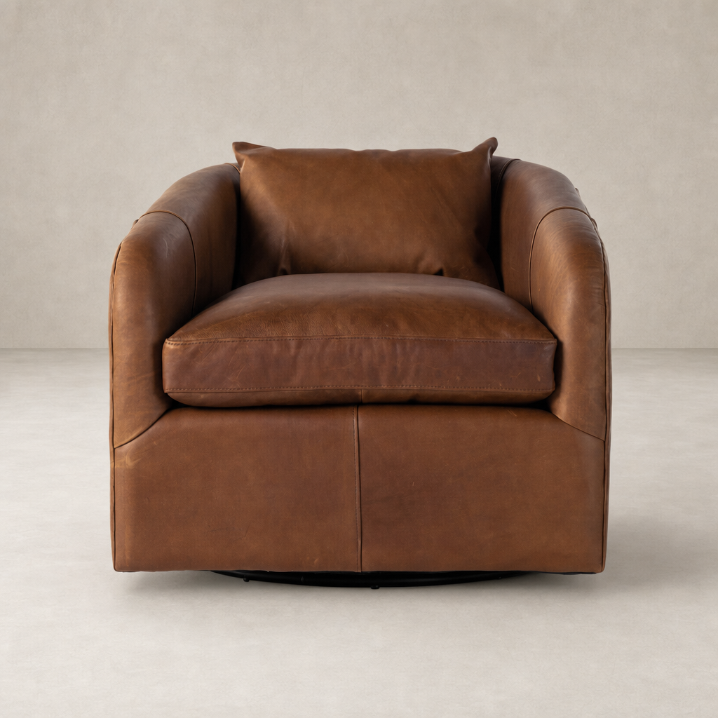 Magnolia Swivel Chair in Heirloom Sienna featuring a plush seat and curved armrests.