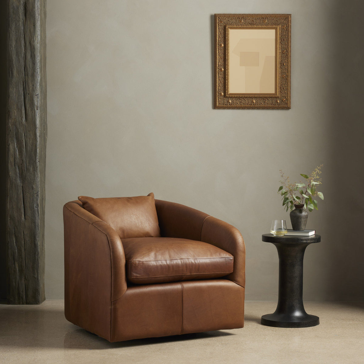 Magnolia Swivel Chair in Heirloom Sienna with plush cushioning and curved design.