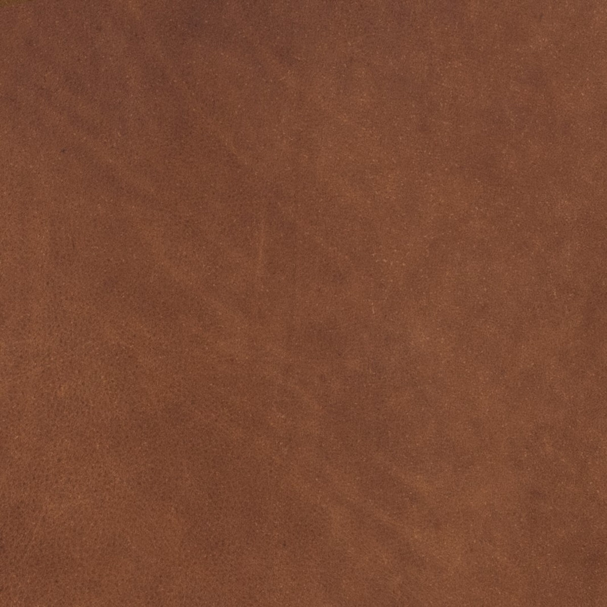 Magnolia Swivel Chair in Heirloom Sienna showcasing rich, textured leather finish.