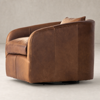 Magnolia Swivel Chair in Heirloom Sienna with curved silhouette and plush cushioning.