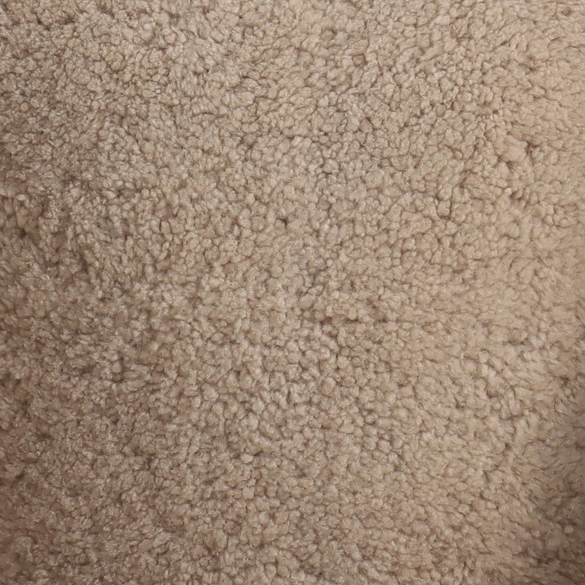 Close-up of beige shearling texture from the Magnolia Swivel Chair.