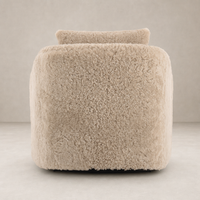 Beige shearling Magnolia Swivel Chair showcasing soft, textured fabric and modern design.
