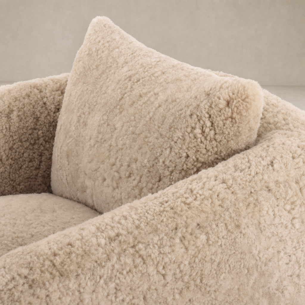 Beige shearling Magnolia Swivel Chair with plush textured upholstery and supportive back cushion.