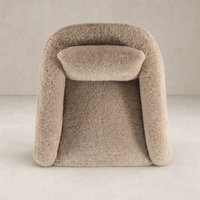 Magnolia Swivel Chair in beige shearling with soft, plush texture and cozy design.