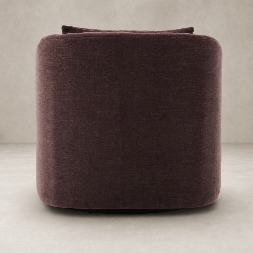 Magnolia Swivel Chair in Laughlin Plum featuring a rounded, modern design and plush upholstery.